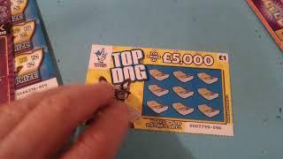 Wow!..what a Cracker of Scratchcard game..Instant Millionaires..£20,000 Green..Top Dog..Super 7..