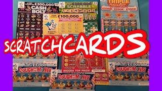 Scratchcards.Triple Jackpot..£500,000 Red..Cash Bolt.£100,000 Yellow.Dough me the Money.& Bonus card