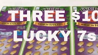 Scratching THREE $10 Illinois Instant Lottery Tickets