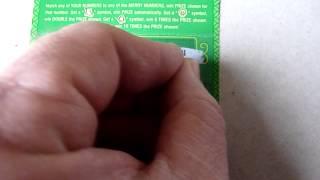 Illinois Lottery $20 Merry Millionaire instant scratch off ticket