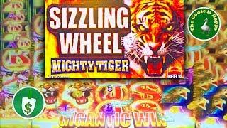 • Sizzling Wheel Mighty Tiger slot machine, 2 sessions, bonus