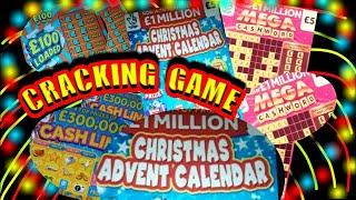 EXTREMELY ENTERTAINING Scratchcard Game"Christmas Advent"MEGA Cashword"Cash Drop"£100 Loaded"Win £50