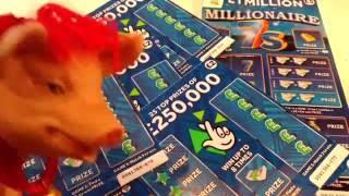 Its a WINNER!!...Scratchcards Millionaire 7's and 250.000 Blue Cards..with Piggy