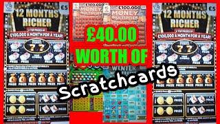 Scratchcards.£40 worth"12 months Richer".Wonderlines".BINGO"Money MULTIPLIER".FRUITY £500s".WIN £50"