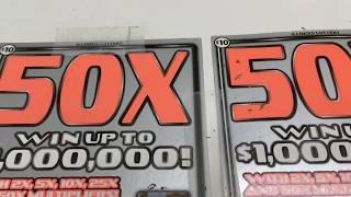 Scratching Two $10 50X Instant Lottery Tickets