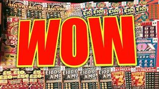WOW.WHAT A SCRATCHCARD GAME. CASH VAULT.CASHWORD.SPINE £100 and MORE