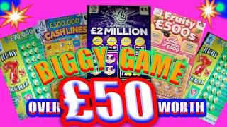 It's a Biggy £50.Scratchcard Game"£2 MILLION Purple"FRUITY £500"RUBY 7s Doubler"CASH LINES"CASH BOLT