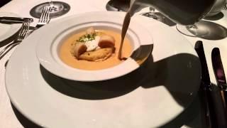 Lobster Bisque - A luxurious presentation of soup at a gourmet restaurant.