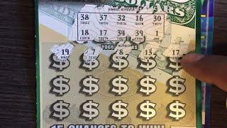 Scratching New York Lottery tickets $20 Wild Cash & $10 Benjamins