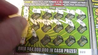 Playing two $30 Illinois Instant Lottery Tickets