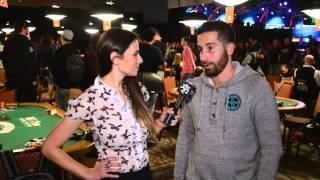 Jonathan Duhamel chats on break  at the High Roller for One Drop