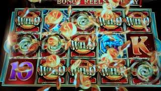 Dragon Spin Slot Machine Bonus - 5 Free Games Win with Locking Wilds Feature (#1)