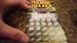 NEW YORK LOTTERY $10,000 WEEK FOR LIFE $20 SCRATCH OFF TICKET. SCRATCH OFF WINNER!