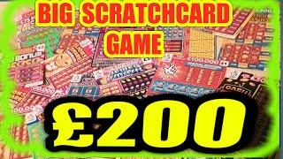 THE BIG £200.00 SCRATCHCARD GAME. CASH SPECTACULAR. CASH 7s.DOUBLER...JEWEL SMASH..