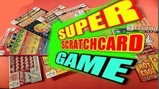 SCRATCHCARD GAME..GOLDFEVER...SPIN  MATCH WIN..FESTIVE LINES..JOLLY 7s..£250,000 GREEN..£100 DOUBLER