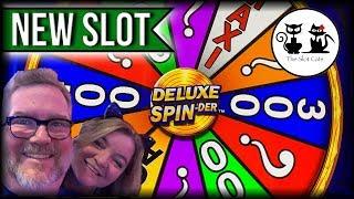 NEW SLOT • DELUXE SPIN-DER •DANCING DRUMS ••