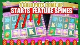 4 GOLD POTS COME UP AND ""TRIGGERS FREE SPINES FEATURE"".....ON SLOT MACHINE ...WOW!