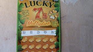 Scratching off a $10 Instant Lottery Ticket from Michigan - Lucky 7s Multiplier