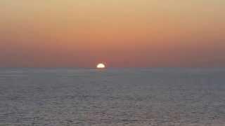 Beautiful Full Disk Sunset - Nature Landscape Scene on the Open Sea